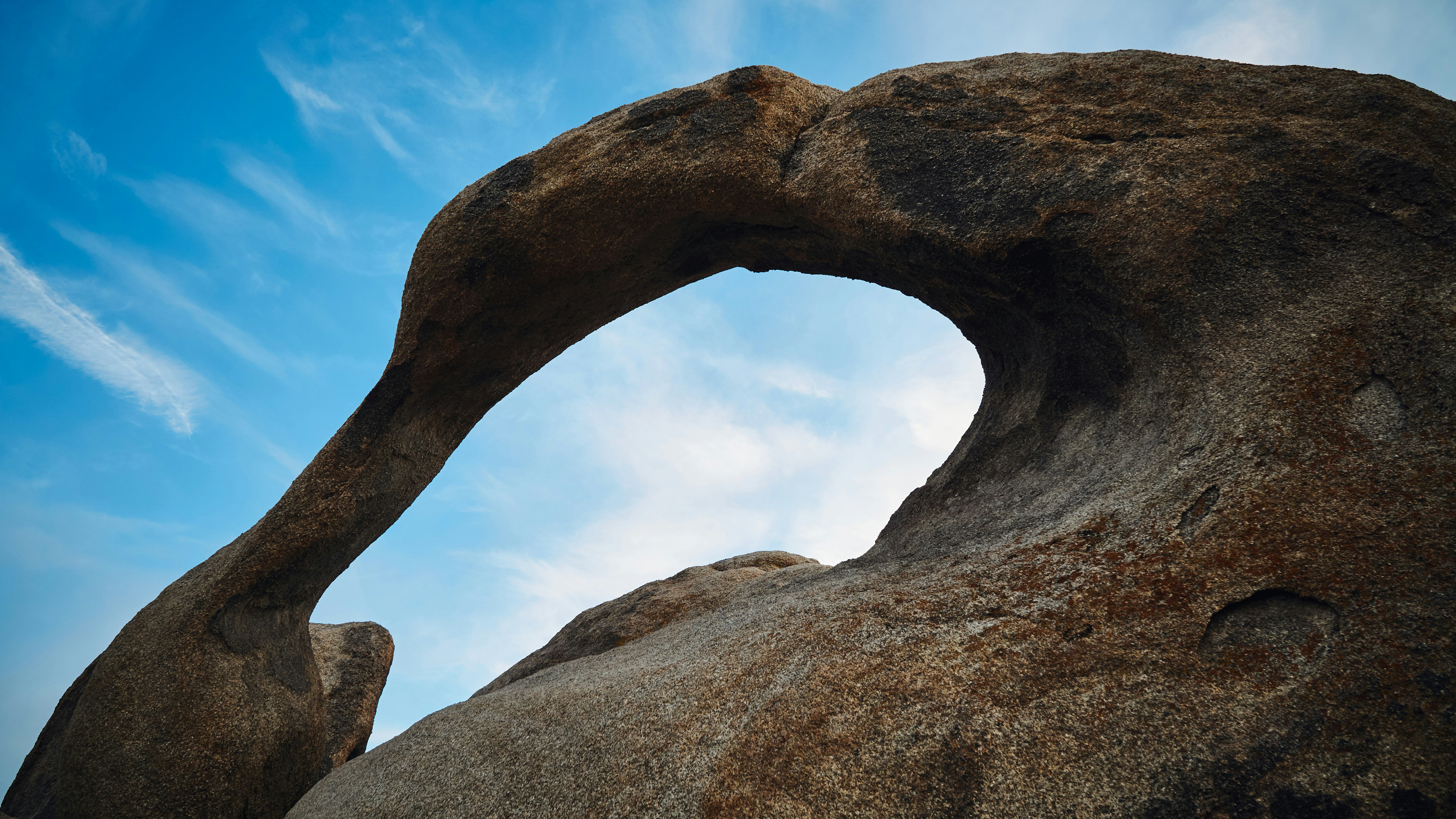 brown rock formation under blue sky during daytime